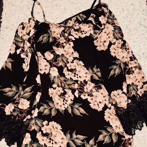 Black blouse with floral pattern